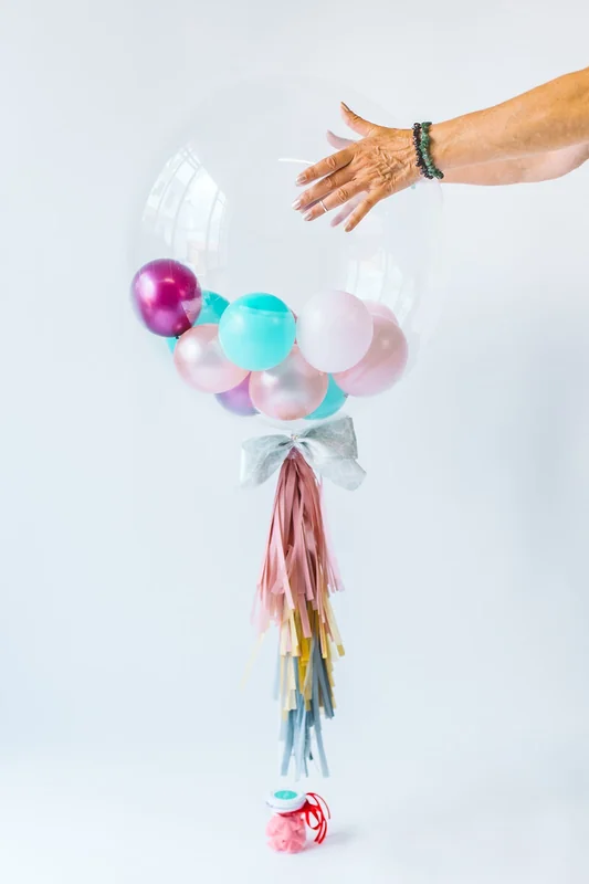 Globos al Aire & Plumas al Viento